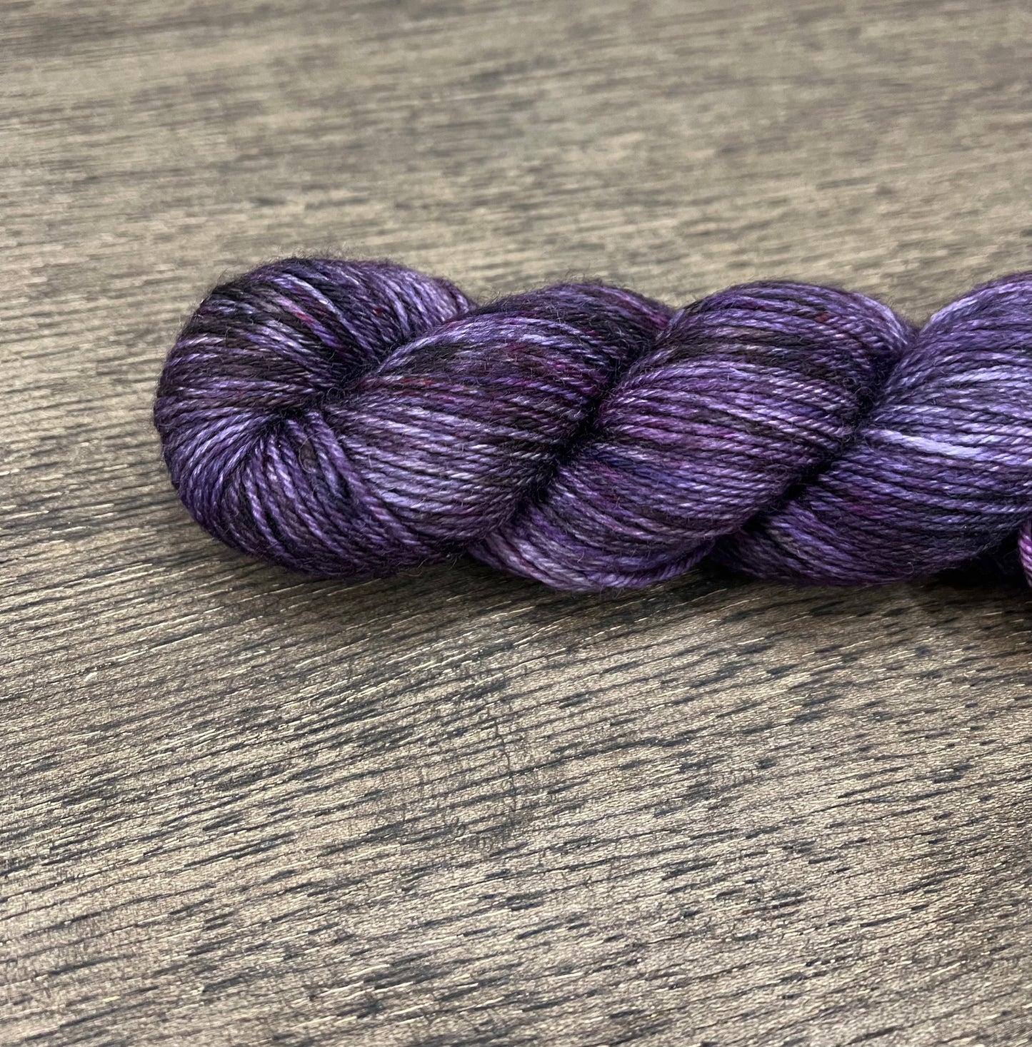 Amarantine - OOPSIE! Tonal/lightly variegated purples and black DK