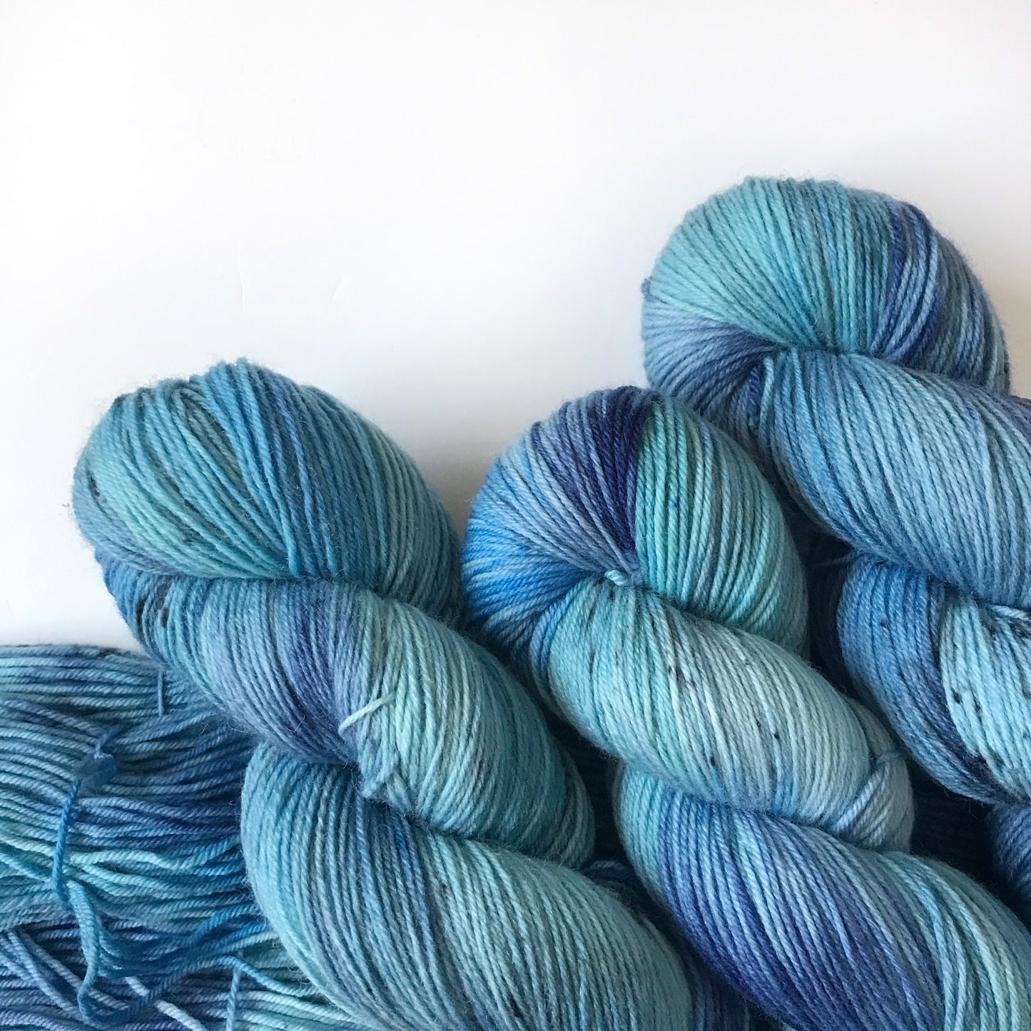 Hand Dyed Yarn “CASCADE” Blue Black Turquoise Speckled SW Merino DK Sock Yarn, Ready to Ship 100g 250 yards