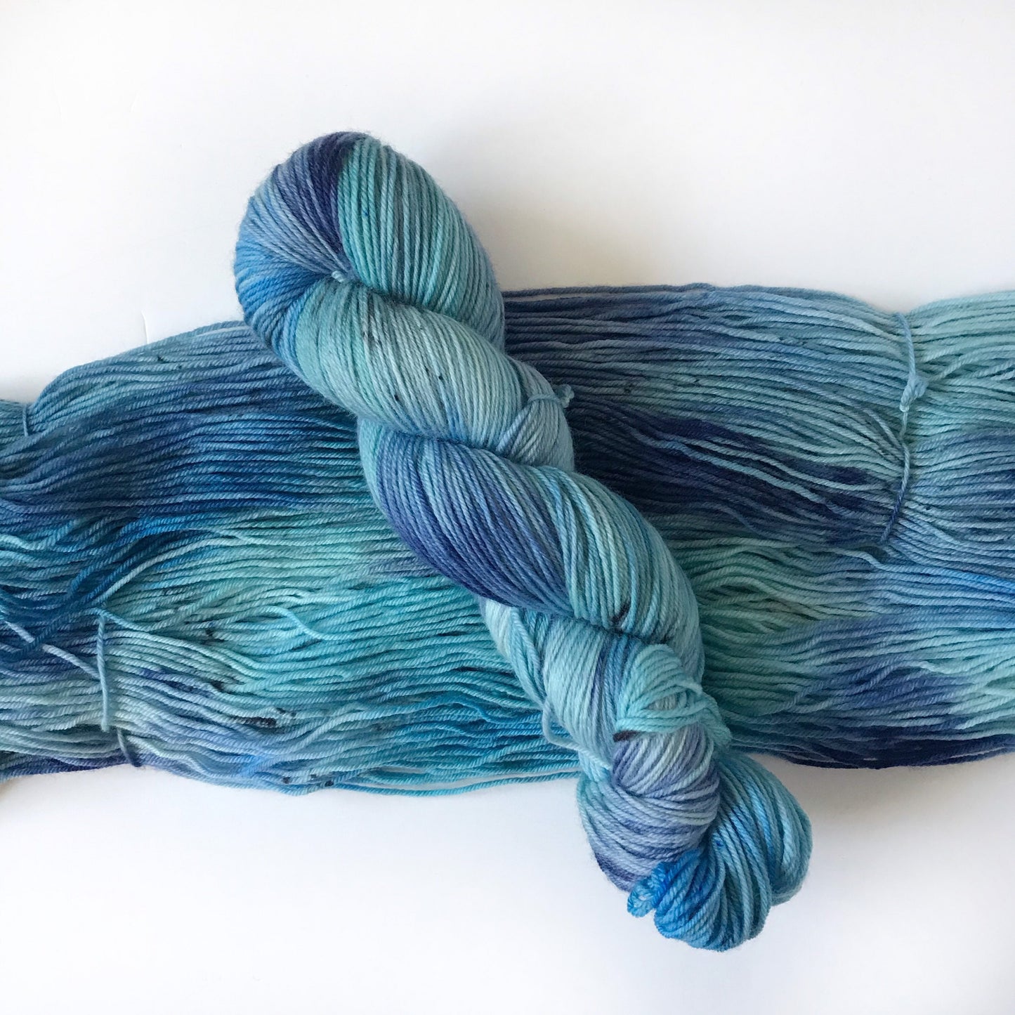 Hand Dyed Yarn “CASCADE” Blue Black Turquoise Speckled SW Merino DK Sock Yarn, Ready to Ship 100g 250 yards