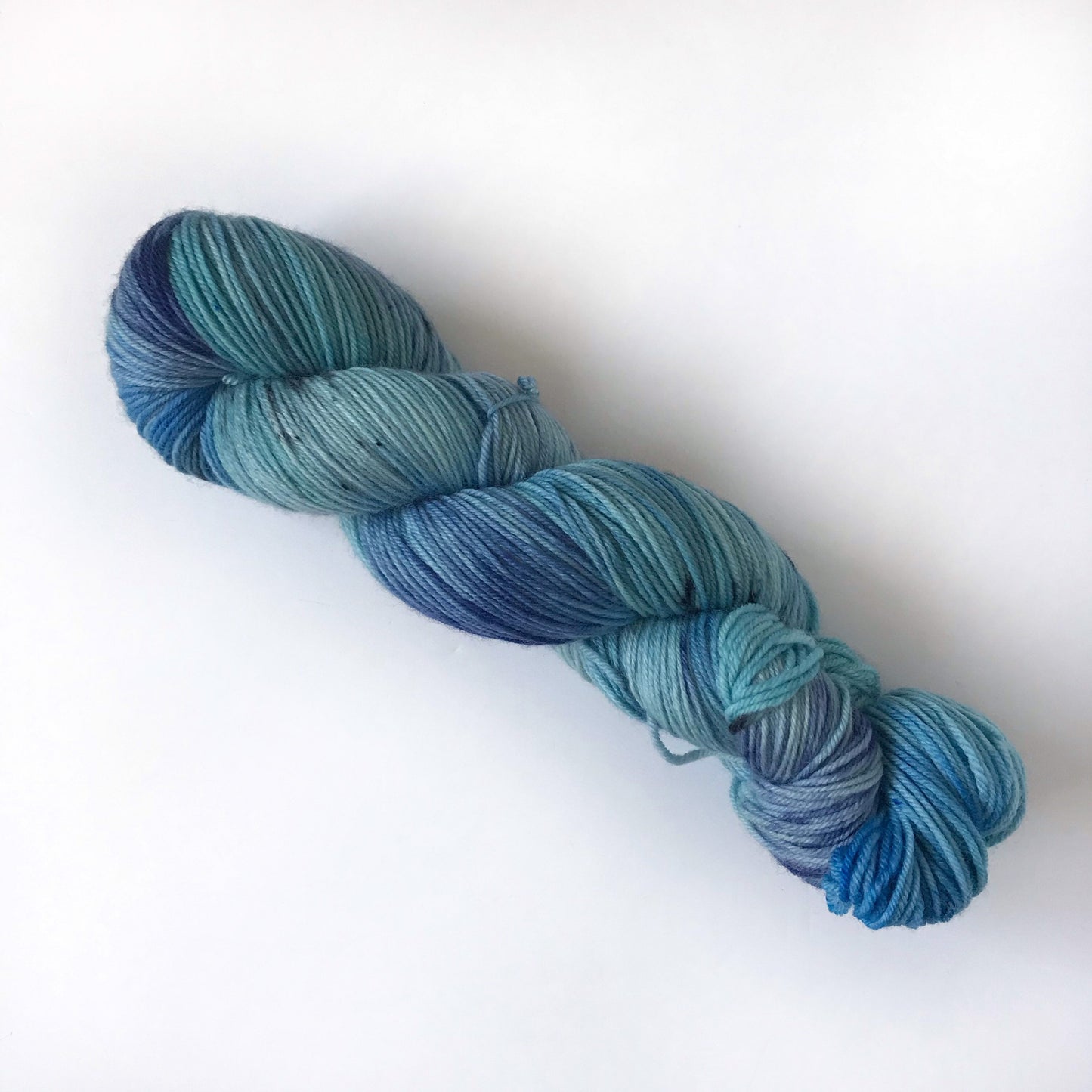 Hand Dyed Yarn “CASCADE” Blue Black Turquoise Speckled SW Merino DK Sock Yarn, Ready to Ship 100g 250 yards