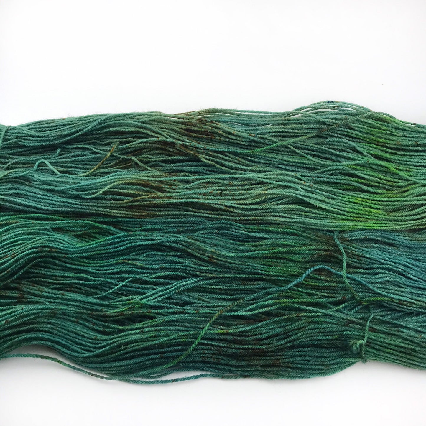 Hand Dyed Yarn “MONSTERA” Greens Brown Speckled SW Deluxe Merino Fingering Sock Yarn, Ready to Ship 100g 437 yards