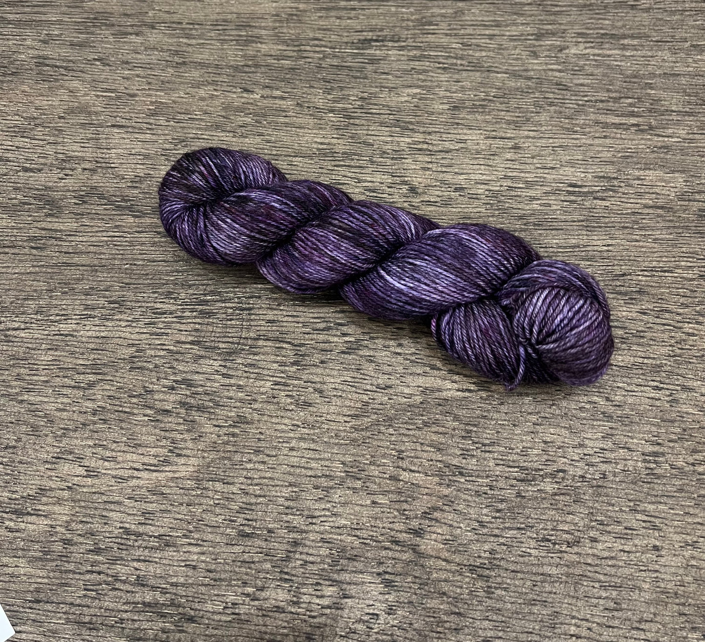 Amarantine - OOPSIE! Tonal/lightly variegated purples and black DK