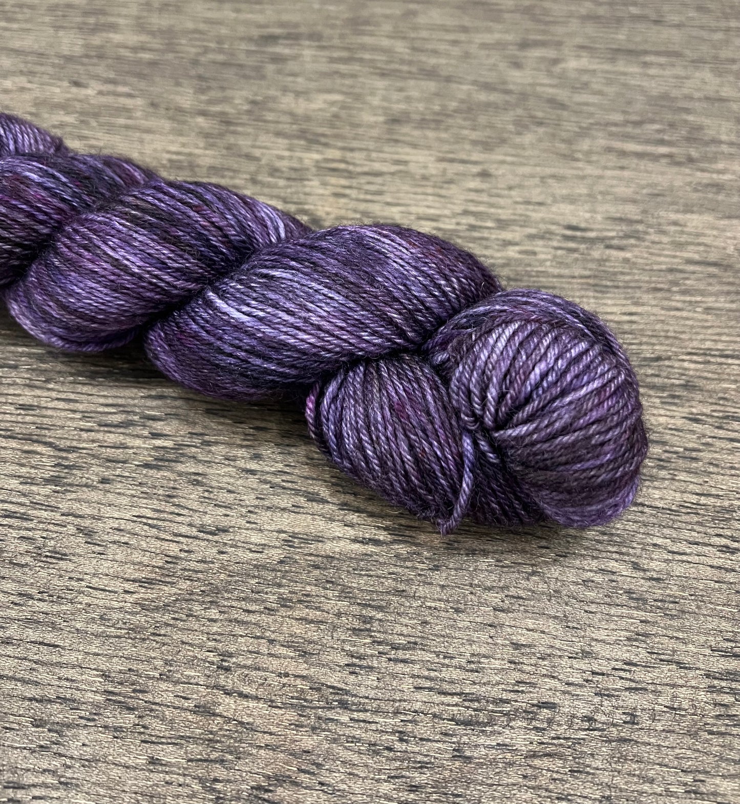 Amarantine - OOPSIE! Tonal/lightly variegated purples and black DK