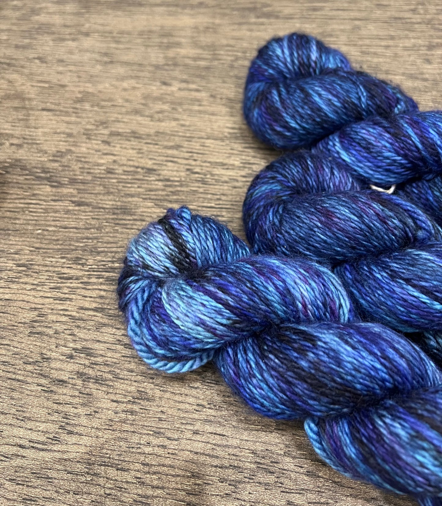 SORCERER’S APPRENTICE - Black Blue  Purple Magenta Variegated Bulky 100g