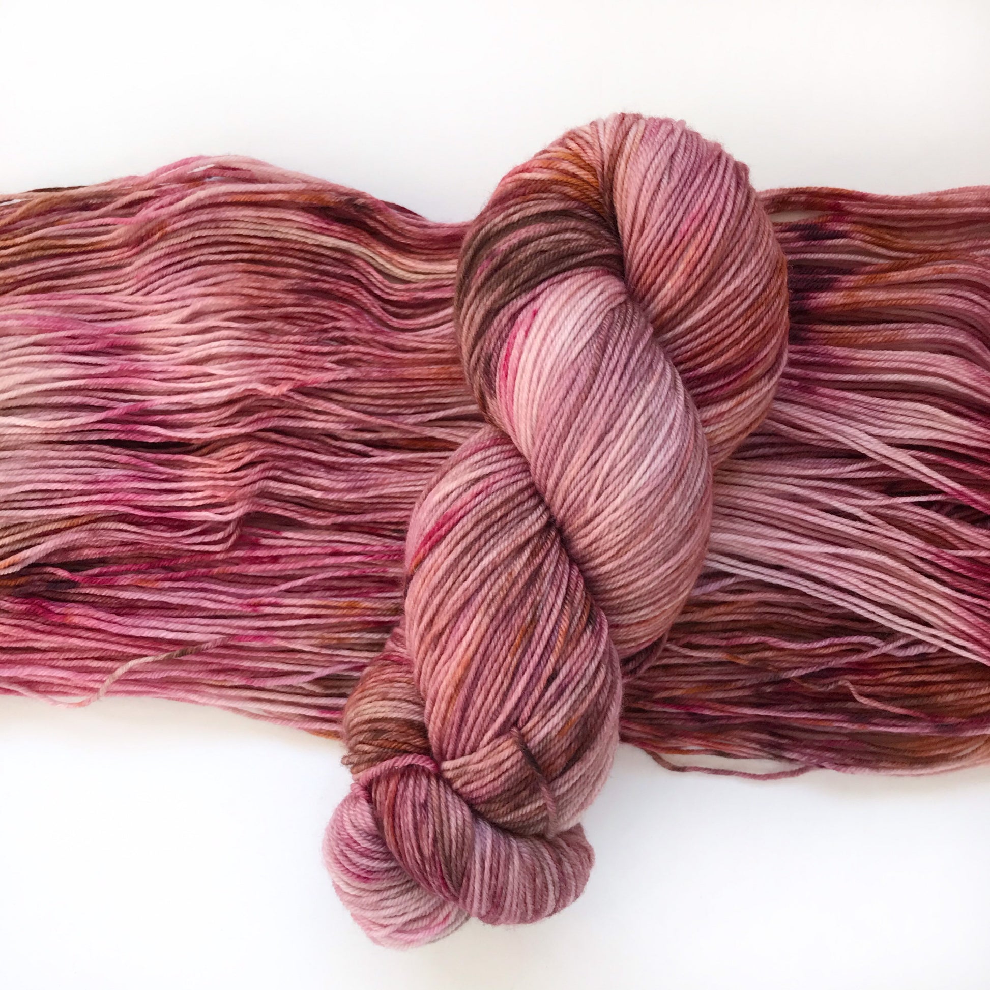 Hand Dyed Merino Wool Yarn: Pink, Copper, & Burgundy - 437m