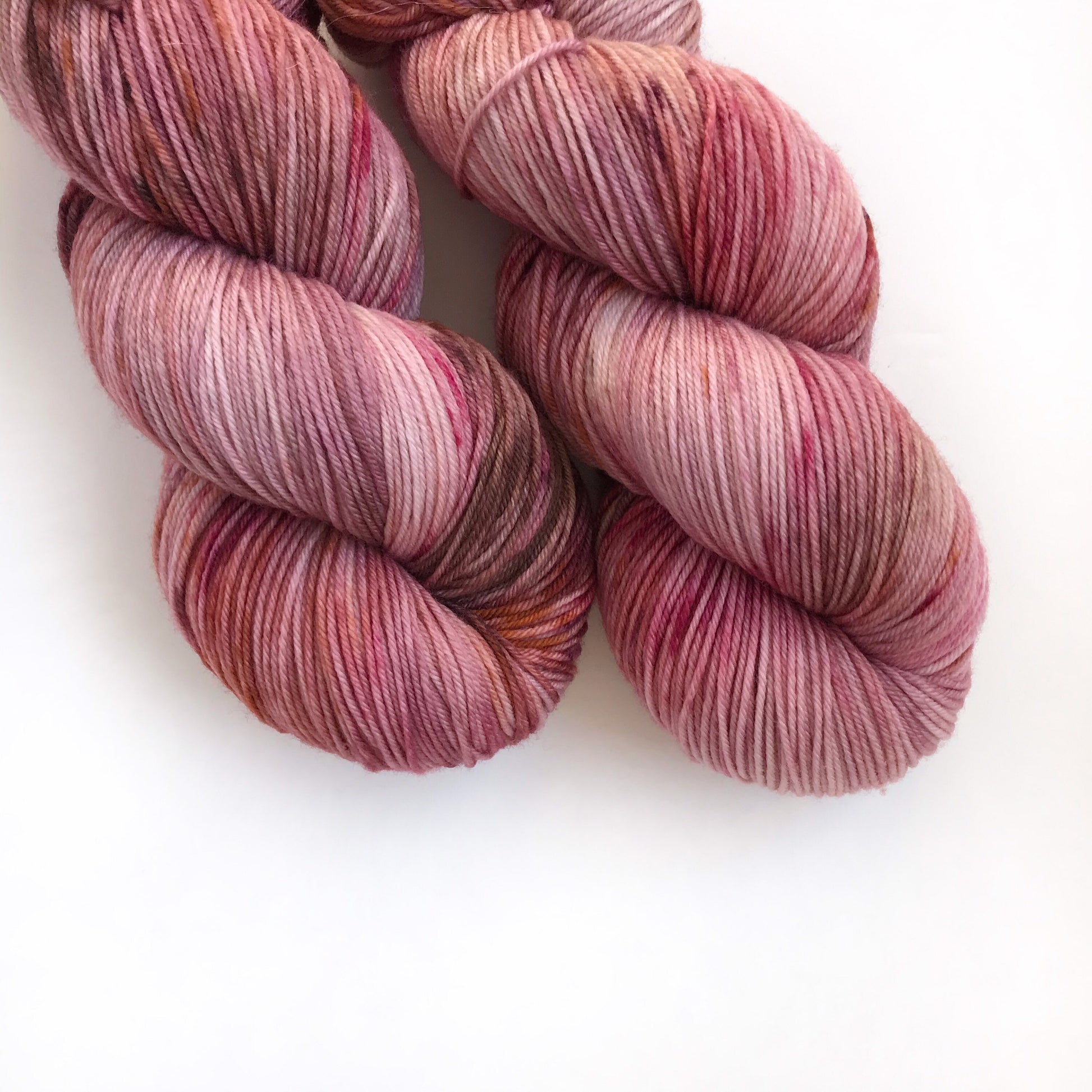 Hand Dyed Merino Wool Yarn: Pink, Copper, & Burgundy - 437m