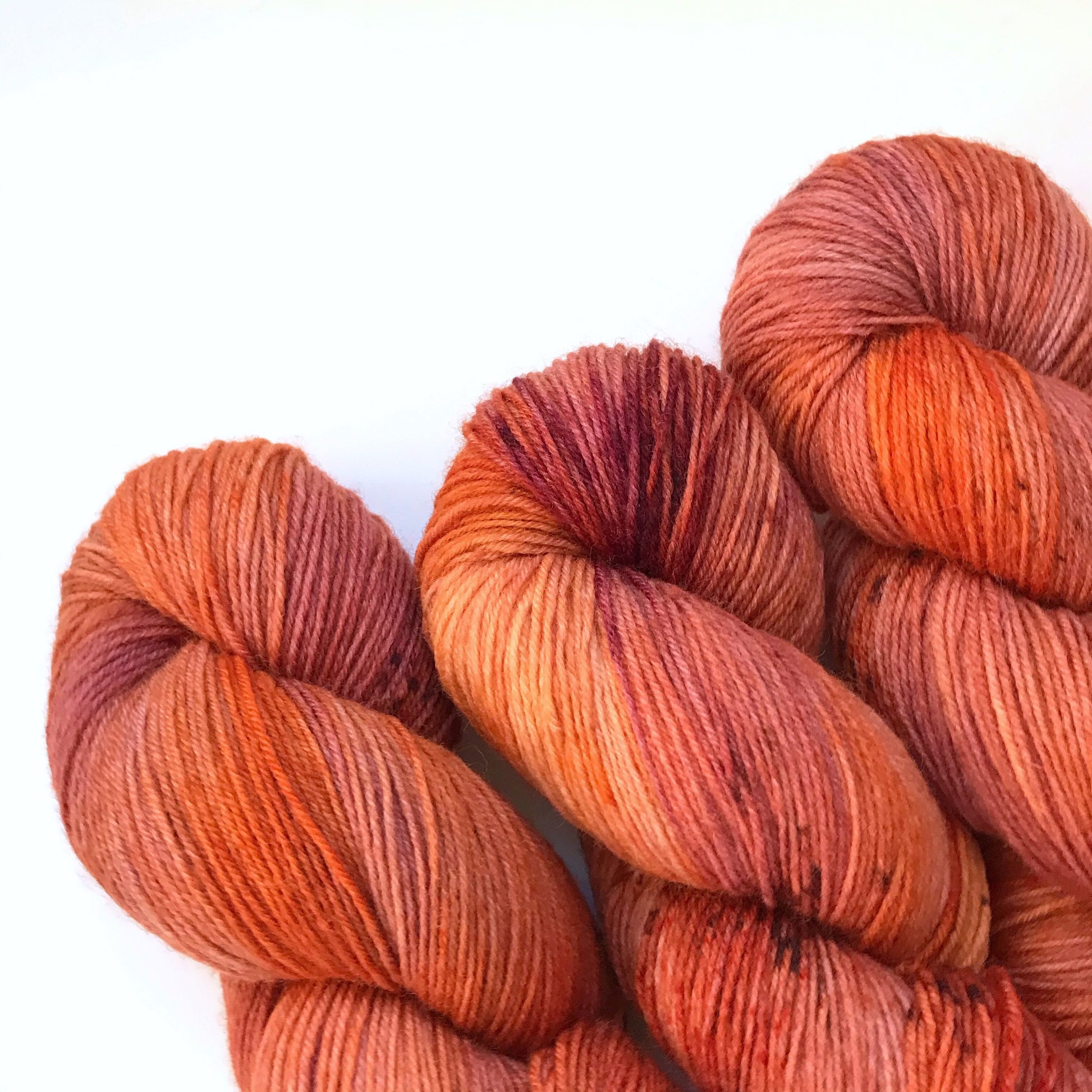 Hand Dyed Merino Sock Yarn: "FIRESIDE GLOW" Burgundy Orange Speckled