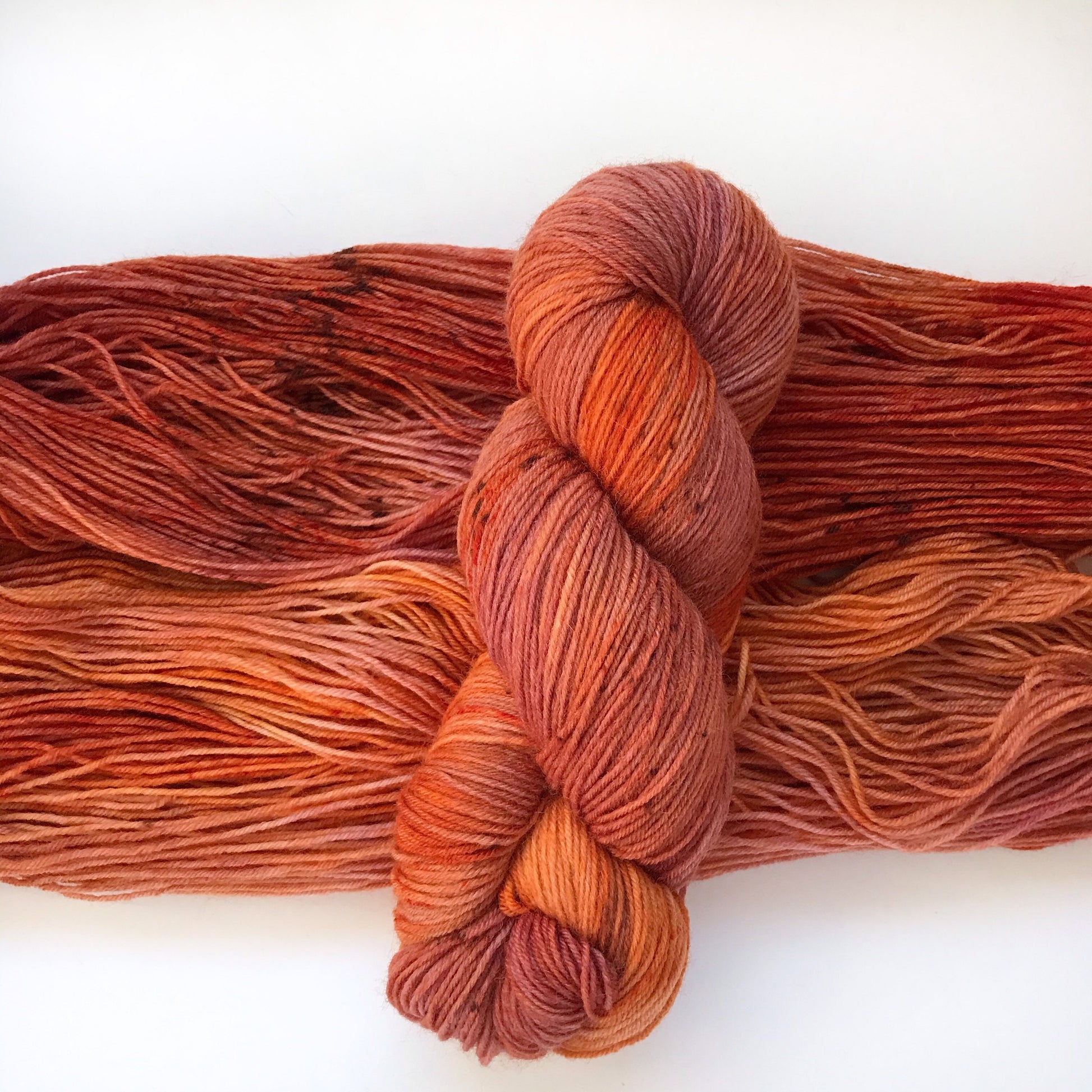 Hand Dyed Merino Sock Yarn: "FIRESIDE GLOW" Burgundy Orange Speckled