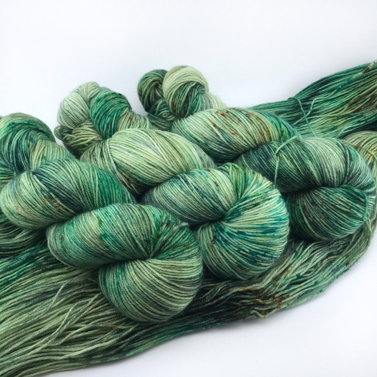 Hand Dyed Speckled Green Merino Sock Yarn: "WOAH, NESSIE!"