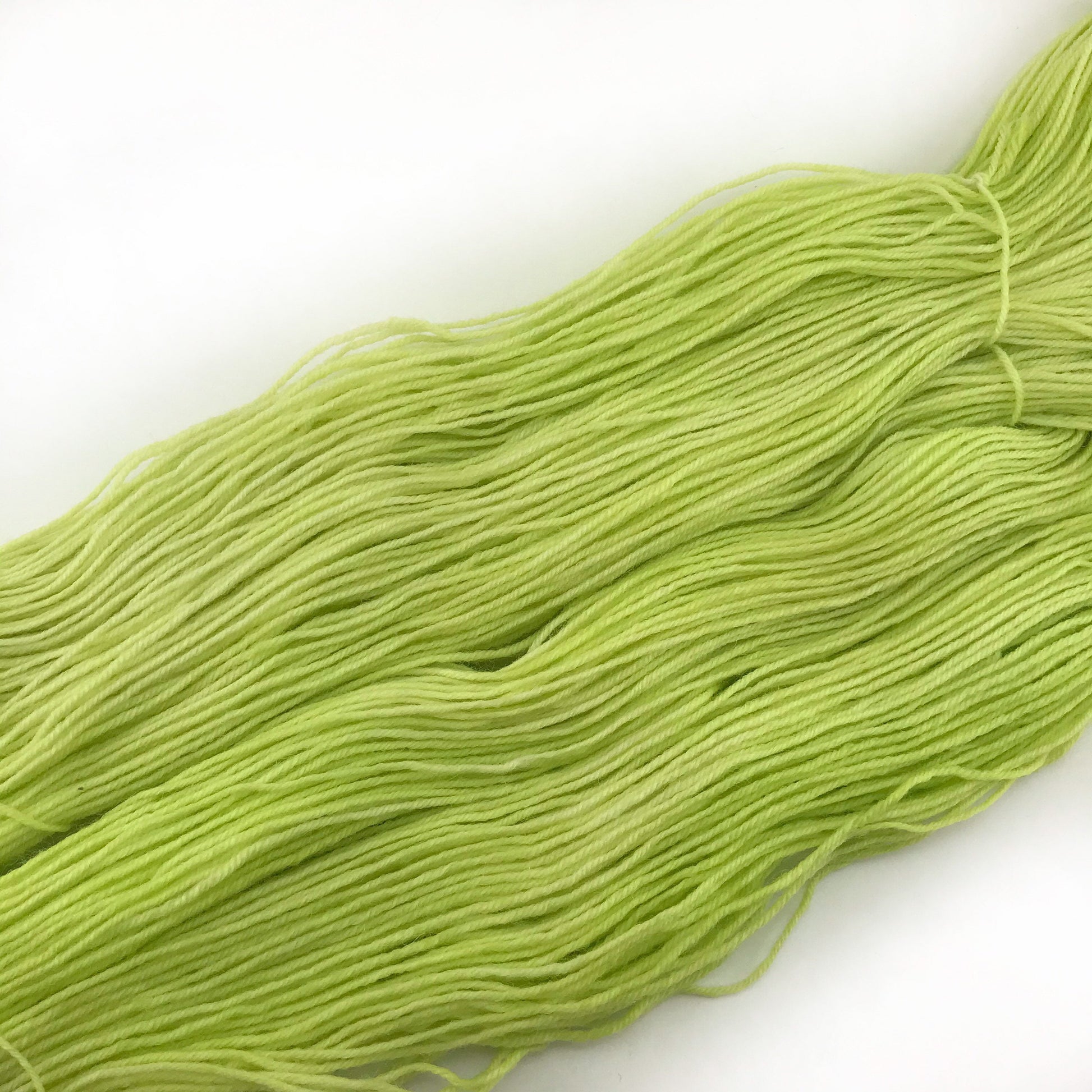 Hand Dyed Superwash Merino Sock Yarn: Neon Green Yellow "Glowbug"