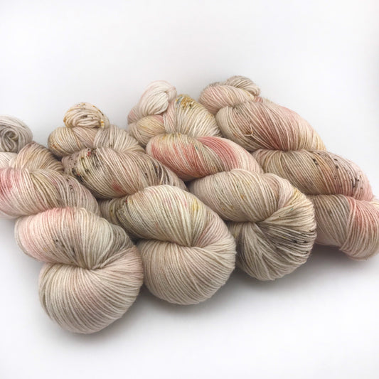 Hand Dyed Superwash Merino Sock Yarn: Antiqued Cream Peach Copper, 437 yds
