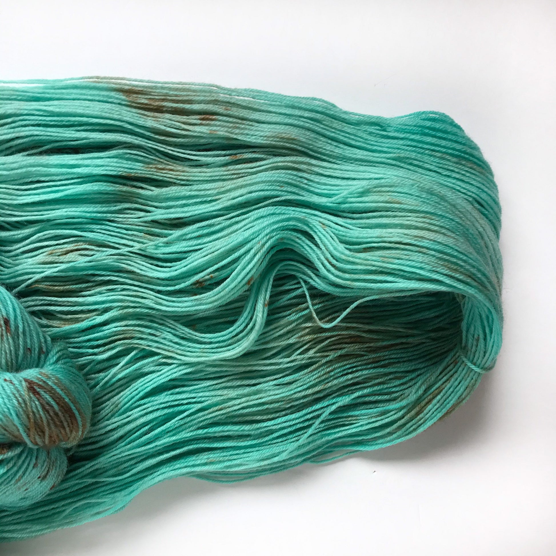 Hand Dyed Yarn “TARNISHED TURQUOISE ” Green Blue Bronze Aqua Speckled Superwash Merino Fingering Weight