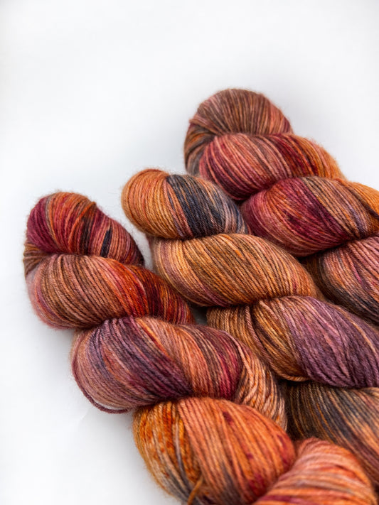 CRUNCHING LEAVES - OOPSIE! Navy Burgundy Orange Cream Brown Variegated DK SUS
